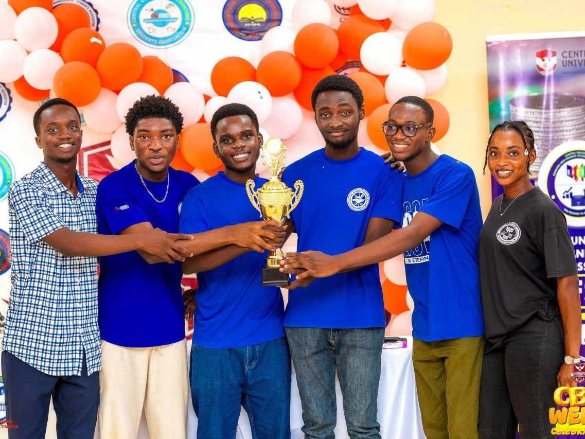 The Accounting Department team holding the 2025-2026 Inter-Departmental Quiz trophy